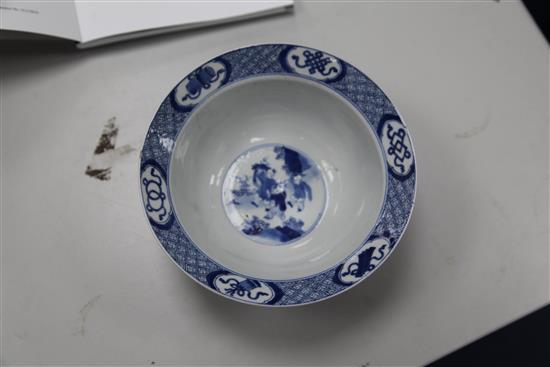 A Chinese blue and white flared bowl, Kangxi period, 21cm diam., broken and restuck